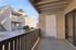 Patio at Silver Creek with cement floor and wood railing