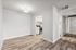 Dining area at peoria grand with wood floors and a light