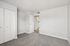 Bedroom at Peoria grand with closet and window, light grey carpet and light grey walls