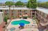 Aerial view of solaris at the biltmore showing the pool and interior area with garden style entry