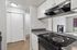 Kitchen at Creekwood with view into living room