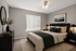 virtually staged bedroom at creekwood apartments