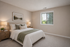 Virtually staged bedroom at Cedar Park apartments