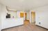 Solthea Apartments living room with view into kitchen
