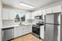 Solthea Apartments kitchen in two-bedroom apartment with window above the sink