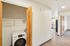 Solthea Apartments hallway with laundry