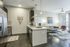 houston heights apartments | apartments on washington ave |Azure Houston Apartment Kitchen and Living Room | Essential Housing Apartment | Houston, TX Apartment