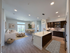 Inviting open-concept living space featuring a modern kitchen with sleek cabinetry, a cozy living room with abundant natural light, and a chic dining area perfect for entertaining.