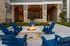 Outdoor Seating with Fireplace at Lakeside Row apartments | 	apartments in Cypress | Cypress. TX apartments | upscale apartments in cypress,tx
