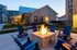 Outdoor Fire Place with Seating at Lakeside Row apartments | 	apartments in Cypress | Cypress. TX apartments | upscale apartments in cypress,tx