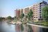 Outer view of the apartments and grounds at One Lakes Edge The Woodlands | Apartments in The Woodlands | The Woodlands, TX Apartments | Luxury Apartments in Woodlands | One Lakes Edge