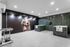 Modern pet grooming room with stylish tile accents, featuring a high-spirited dog mural and professional grooming equipment.