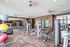 Modern apartment gym with state-of-the-art exercise equipment, vibrant stability balls, and large mirrors for optimal workouts.