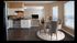 Kitchen and dining area with stainless range, round table and window blinds