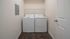 Laundry room with full-size washer and dryer