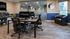 Cyber cafe with computer desk, office chairs and lounge chair