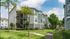 Three-story buildings with stairwell, lawn and walkways, Houston, TX