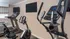 Modern fitness center with state-of-the-art exercise machines and sleek design.