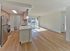 Spacious open floor plan with plank flooring