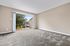 Spacious bedroom with access to private deck