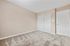 Fully carpeted bedroom