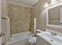 Upgraded bathroom with tile