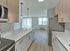 Kitchen with stainless steel appliances