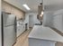 Renovated kitchen with large breakfast bar