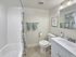 Renovated bathroom with custom tile