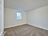 Bedroom with wall-to-wall carpeting