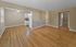 Open floor plan with hardwood floors