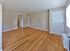 Open floor plan with hardwood floors