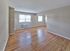 Open floor plan with hardwood floors