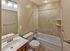 Renovated bathroom with custom tile surrond