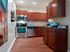 Renovated kitchen with stainless-steel appliances