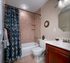 Renovated bathroom with custom tile surrond