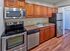 Renovated kitchen with stainless-steel appliances