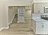 Chef-inspired kitchens with stainless-steel appliances at Woods Edge Apartments