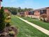 Lush landscaping and perfectly manicured lawns at Woods Edge Apartments