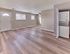 Bright open-layout apartment with in-unit washer and dryer at Village Square Apartments.