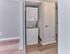 Stackable in-unit washer and dryer at Village Square Apartments.