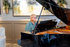 Resident Playing Piano at Attivo Trails Ankeny | Ankeny, Iowa
