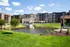 Lake with Patios | Attivo Trails Waukee | Waukee, Iowa
