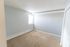 carpeted bedroom with window