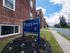 folcroft courts apartments sign and view down sidewalk