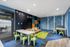 spacious seating area in the clubhouse at Vibe Appartments