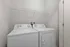 In-unit washer and dryer in modern two-bedroom apartment at The Ave Apartments Clintonville Columbus OH