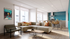 lounge area with comfy seating. High-rise tables with barstool, and community kitchen