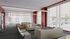 lounge area with comfy seating, vending machines and floor to ceiling windows