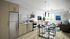 common area with cabinets, stainless steel appliances, high-rise dining table and view of living room